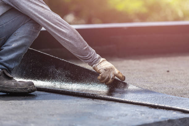 Professional Waterproofing technician working in Auburn, KY